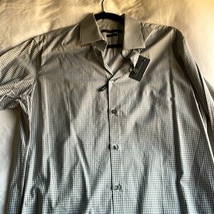 Varvatos 16 inch neck modern fit stretch. Fiancé didn’t like the color on me.